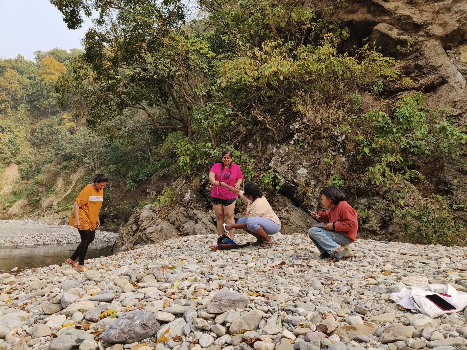 Travellers gathering beside the river